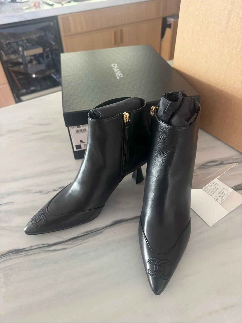 CHANEL Black Leather Pointed Ankle Boots with Sculpted Heel